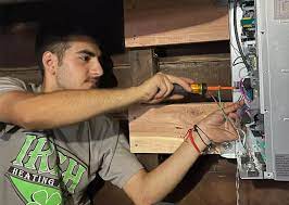 Fix4U Repairs' technicians fixing Malfunctioning AC Circuit Boards problem in GTA  