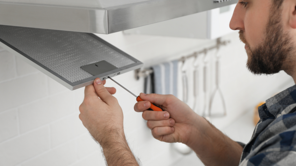 Fix4U repair Technicians performing JennAir Range hood repair