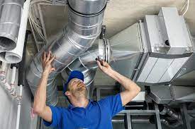 Fix4U Repairs' technicians fixing Damaged AC Ductwork problem in GTA