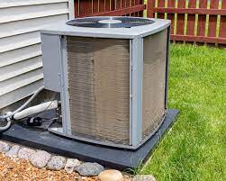 Fix4U Repairs' technicians fixing Blocked or Dirty Outdoor AC Units problem in GTA  