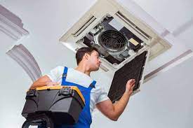 Fix4U Repairs' technicians fixing an Overheating AC Condenser problem in GTA  