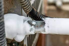 Fix4U Repairs' technicians fixing frozen ac evaporator coils  problem in GTA  