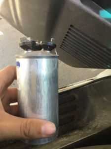 Fix4U Repairs' technicians fixing bad ac capacitors  problem in GTA  