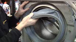Fix4U Repairs' technicians fixing  washer door seal problem in GTA  