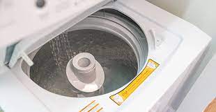 Fix4U Repairs' technicians fixing washer wont drain problem in GTA