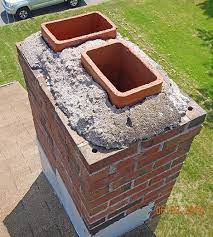 Fix4U Repairs' technicians fixing Fireplace Chimney Cap or Crown Damage problem in GTA