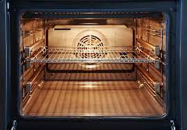 Fix4U Repairs' technicians fixing oven not cleaning itself problem in GTA  