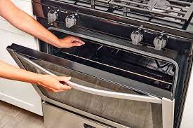 Fix4U Repairs' technicians fixing oven
not heating properly problem in GTA