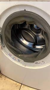 Fix4U Repairs' technicians fixing washing machine making loud noise problem in GTA  